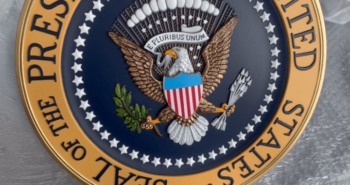 Presidential Seal Controversy Hits TRUMP Memecoin Holder Event