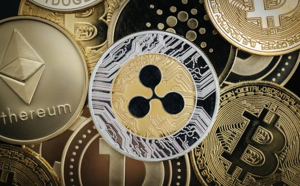 XRP Price At $23, Dogecoin To $2, And Solana At $1,800? Analyst Unveils 2026 Predictions
