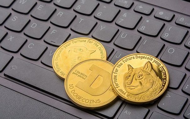 Dogecoin Remains Inside Falling Channel, Bulls Target Surge Above $0.1