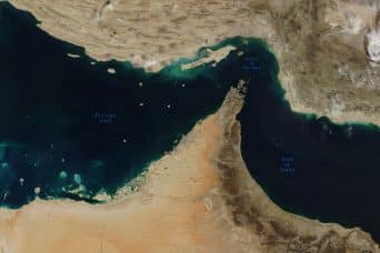Iran claims Strait of Hormuz open, traders skeptical without vessel movement
