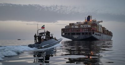 Ships refuse US military guided transits in Hormuz as Iran demands crypto tolls