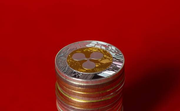 Coinbase And Ripple CEOs Reportedly Meet Howard Lutnick Over CLARITY Act