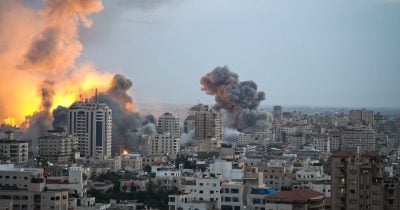 Israeli airstrike on Gaza road kills two, injures others amid conflict