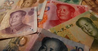 China accelerates yuan internationalization, bypasses dollar in trade